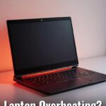 Dark laptop with red heat glow on desk showing overheating problem with text “Laptop Overheating? 7 Easy Fixes (2026)”