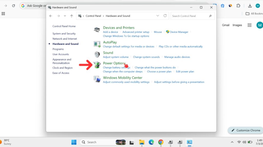 Windows Control Panel window displaying Hardware and Sound settings with a large red arrow pointing to the Power Options link.