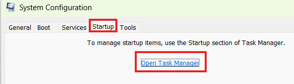  Windows System Configuration utility under the Startup tab showing a red box highlighting the Open Task Manager link.