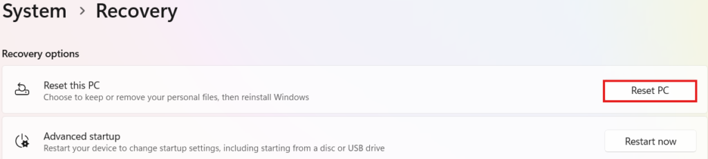 Windows Settings menu under System Recovery options with a red box highlighting the Reset PC button.