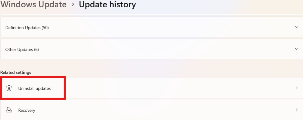 Windows 11 Update history settings page with a red box highlighting the Uninstall updates option under Related settings.