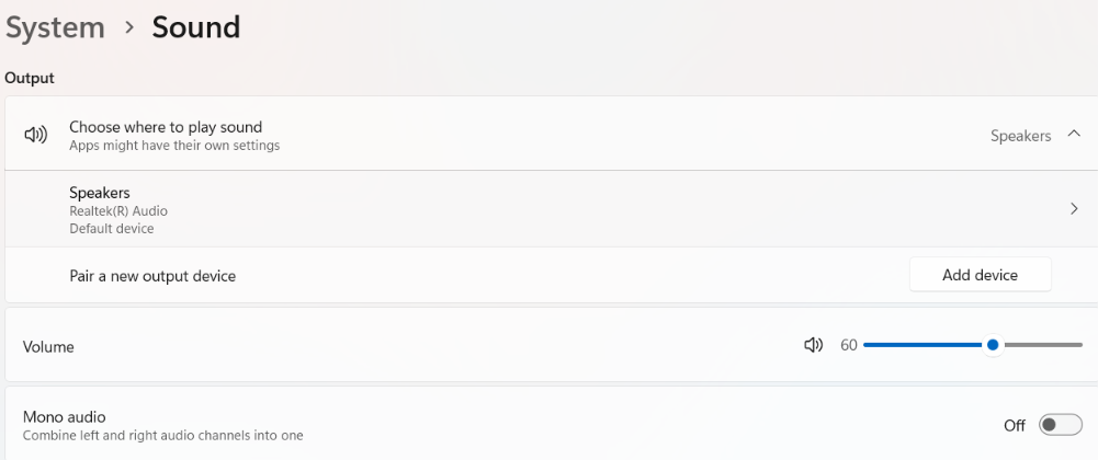 Windows 11 Sound settings panel showing output options with Speakers selected and the volume slider set to 60.