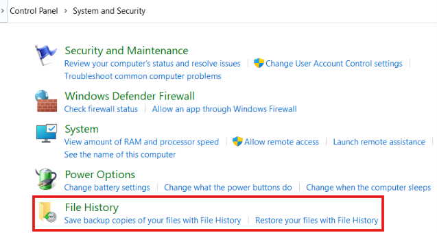 Windows Control Panel System and Security page with a red box highlighting the File History section and its option links.